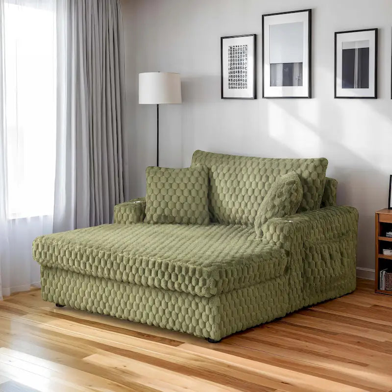 Chaise moderna imbottita con due braccioli e seduta oversize