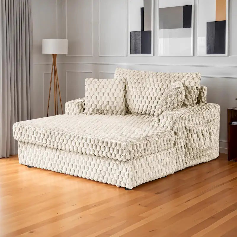 Chaise moderna imbottita con due braccioli e seduta oversize