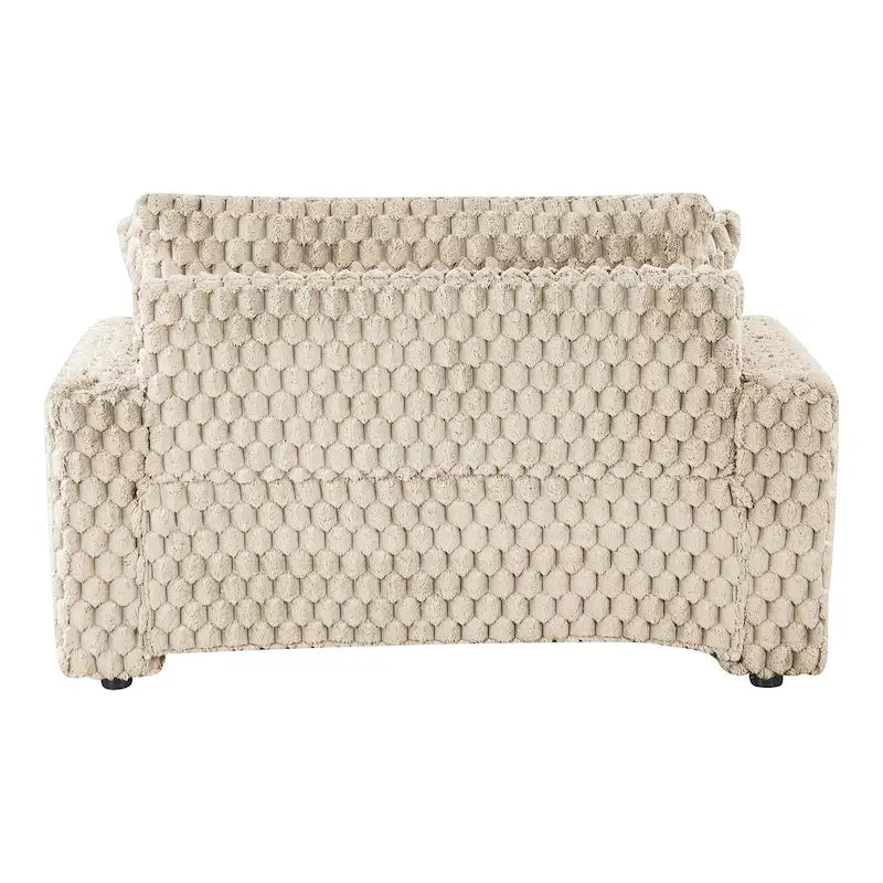 Chaise moderna imbottita con due braccioli e seduta oversize